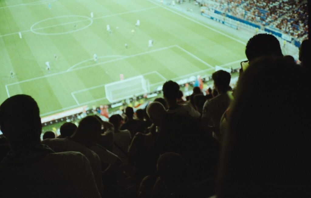 Fans in a stadium watching a European football final