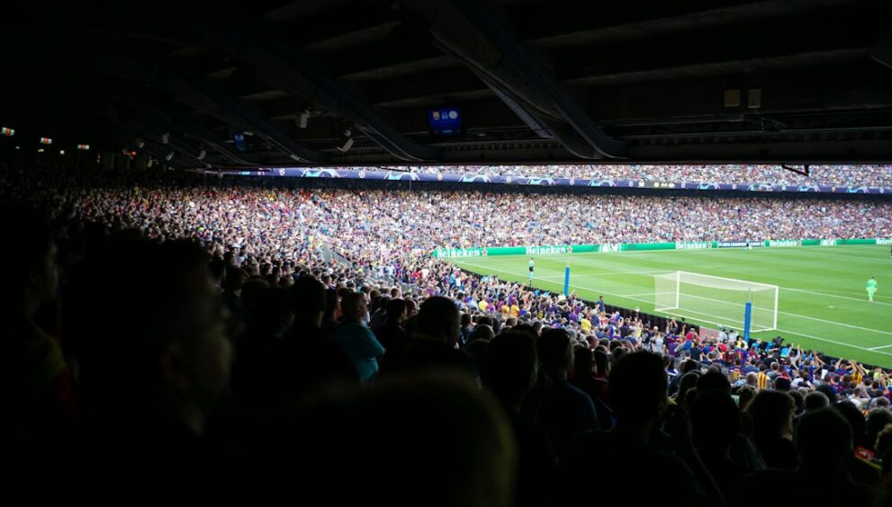Spanish football fans watching a match in Barcelona