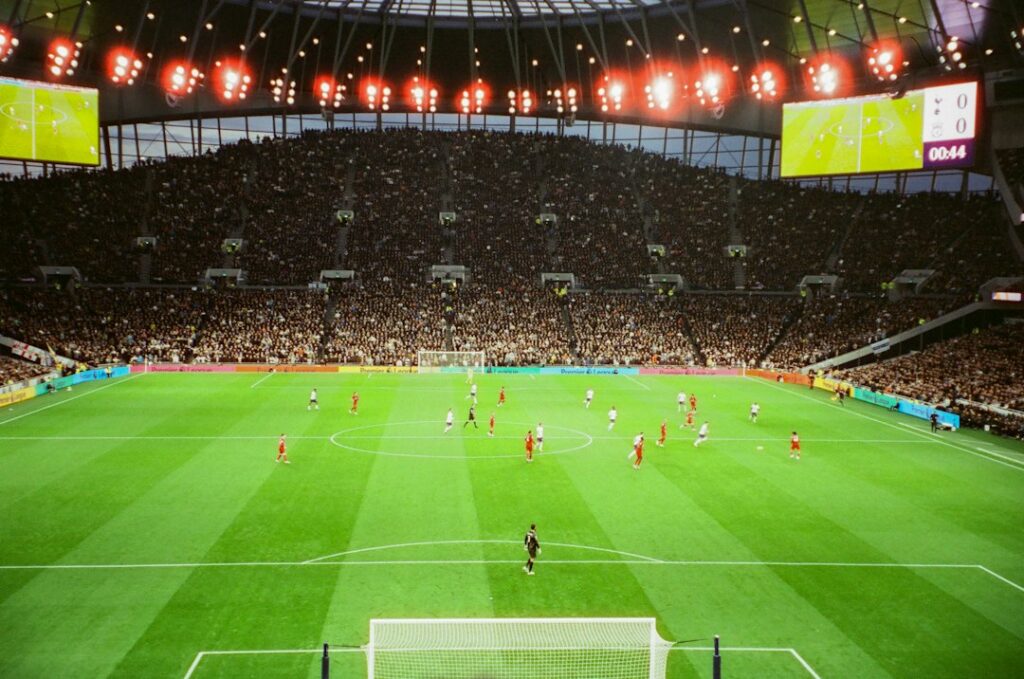 Packed football stadium during a Premier League style match