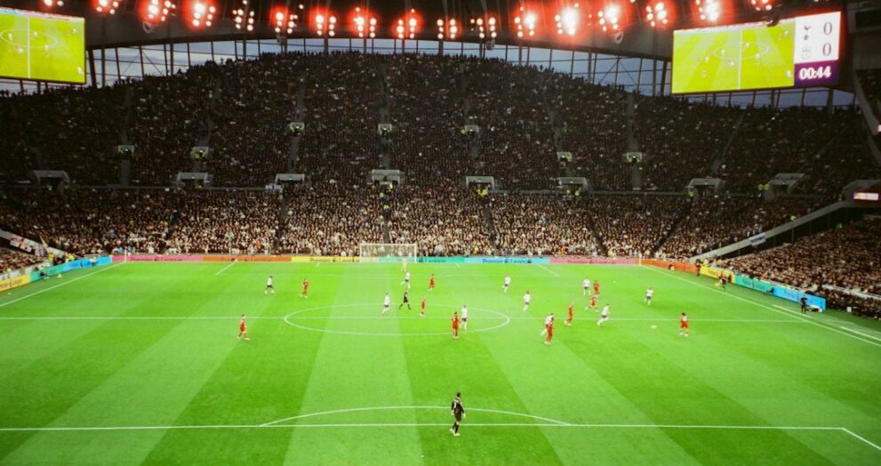Packed football stadium during a Premier League style match