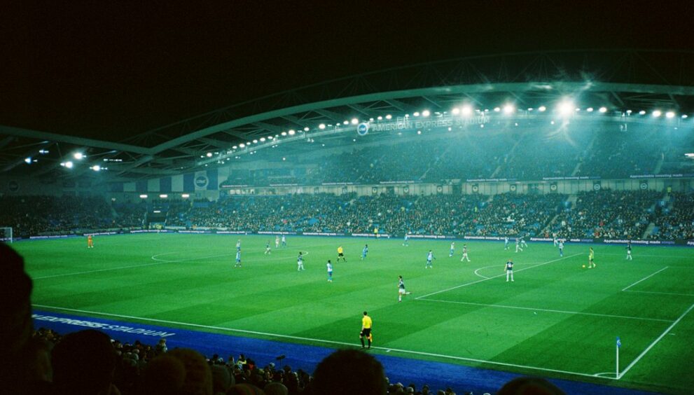 European football match in a stadium at night